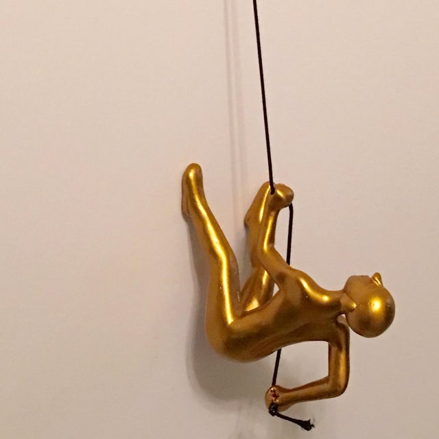 This climbing man is a new design. A bigger, heavier Climbing Man Wall Art. Great as a holiday gift!