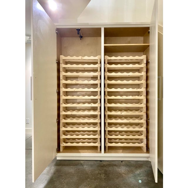 Light raw pine modular wine racks in excellent condition. Modular design allows for any number of configurations. Will...