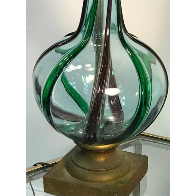 Pair of modern tricolor twist murano lamps, 1960’s. Glass body measures 24” alone. Overall height is 32” with a 10” diameter.