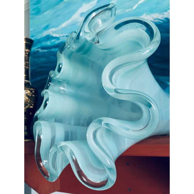 Large 15” Murano style frosted Vase with blue and white foam waves running through the vase. This is a beautiful one if a...