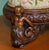 English Walnut ornately hand carved footstool with period castors and Embroidered top A very good looking well made and...