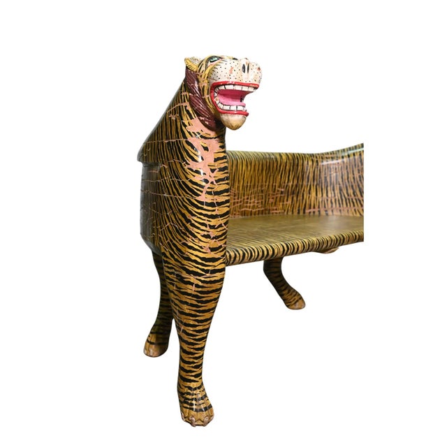 This striking vintage wooden bench is masterfully carved in the form of a Tiger, complete with a sculpted head and tail,...
