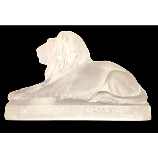 Pressed and molded glass advertising paperweight for the pharmaceutical product IODONE Sulfoïde Robin.