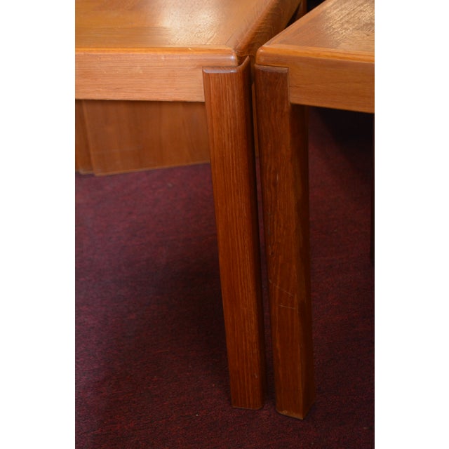 Great pair of Danish end/side tables. Both stamped underneath. A 2 tone teak wood with variations in color.
