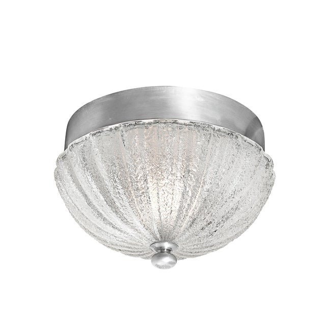 This pair of mottled and fluted glass flush mount chandeliers, crafted in Italy during the 20th century, beautifully...