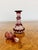 Quality antique Victorian glass spirit perfume bottle and stopper having a red and clear glass body with etched fruiting...