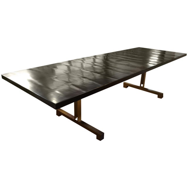 Impressive handmade dining table shown with our Minimalist cube base in a bronze-plated steel. The cherrywood top has been...