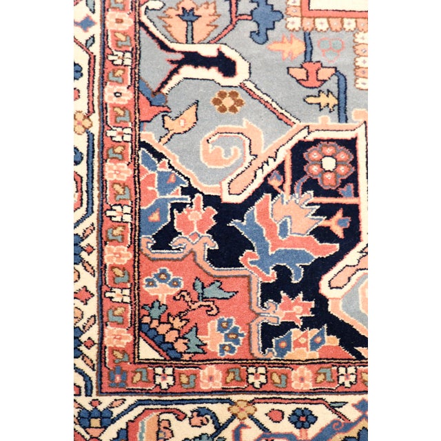 Introducing the Serapi Collection: a timeless masterpiece hand-knotted from 100% pure wool. This exquisite area rug in an...