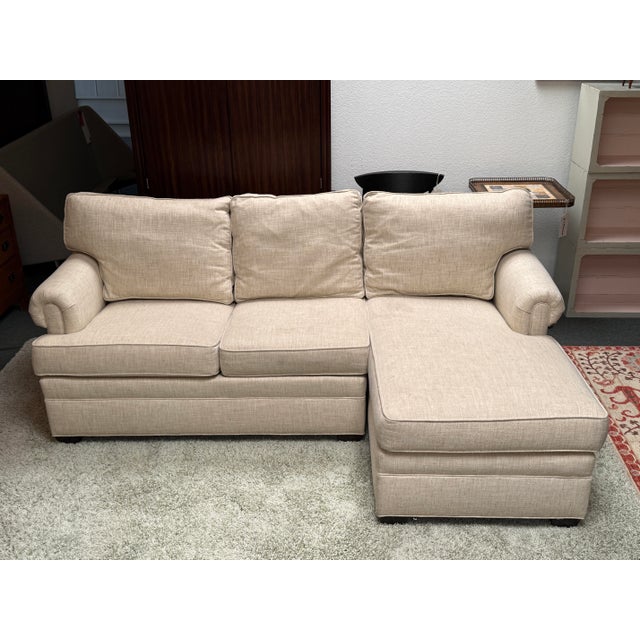 Design Plus Gallery presents a Chaise Lounge Sectional from Ethan Allen. The sectional has a traditional profile with...