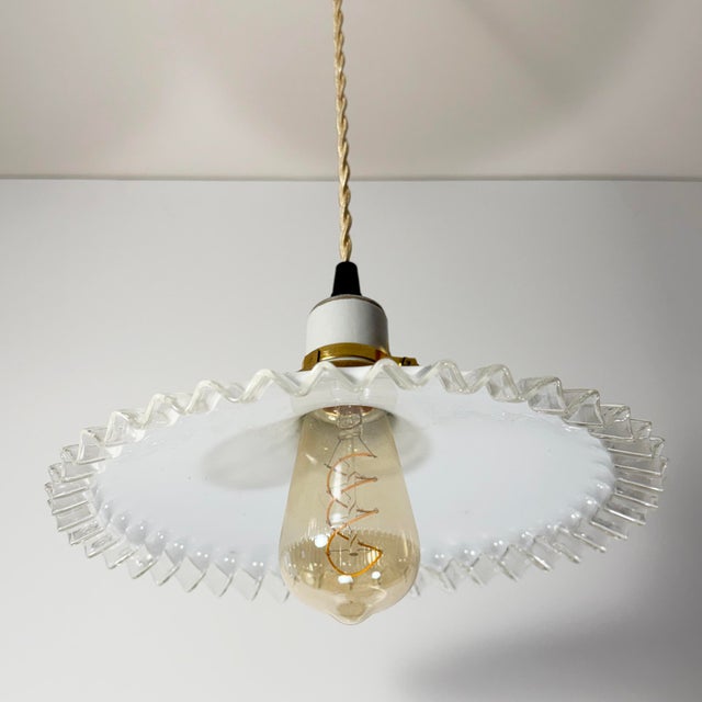 A beautifully hand-blown French white opaline glass pendant light dating to the 1930s. Sourced in Provence, this classic...