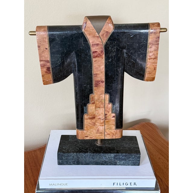 1980's Maitland-Smith ebony and pink tessellated stone Kimono on a mounted black tessellated stone base with inlaid brass...