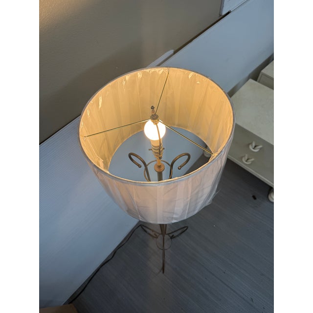 Design Plus Gallery presents an Iron Scroll Floor Lamp. The Sculptural metal frame is composed of three slender vertical...