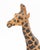 Two Standing Giraffe Hand-Painted Leather Sculptures, each with inset glass eyes. Taller: 10.25" H x 5.5" W x 2.5" D....