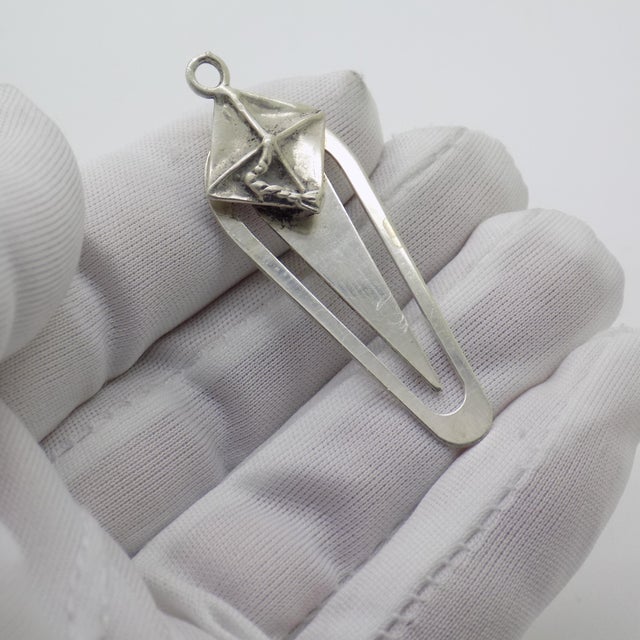 A meaningful vintage bookmark created for charms, handmade in Arezzo, Tuscany, Italy between the 1980s and 1990s in...