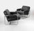 Set of two armchairs with structure made of a chromed tube and black skai by Guido Faleschini. Italy 1970s. Very good...