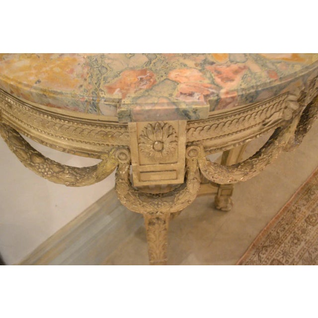 Louis XVI style console table with marble top.