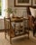 This vintage Baker Furniture burl wood Canterbury magazine rack captures the elegance of classic bamboo-inspired design....