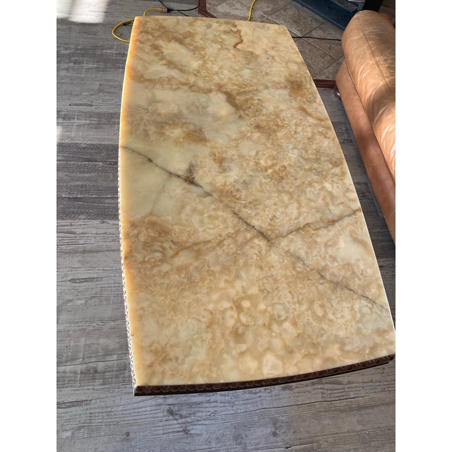 Wilhelminian-Style Coffee Table Features a Polished Honey-Toned Onyx or Marble Slab Top Resting on an Ornately Carved Double-Pedestal Wooden Base For Sale - Image 6 of 12