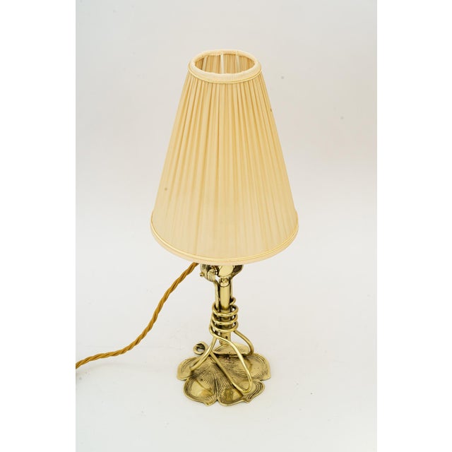 Jugendstil table lamp or wall lamp vienna around 1908 Brass polished and stove enameled The second picture shows the lamp...