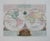 This is a very handsome double-hemisphere world map. California is shown as a prominent island, the Great Wall is shown in...