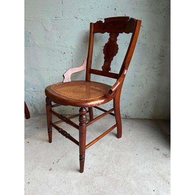 Wood Early 20th Century Pair of Antique Eastlake Walnut Cane Seat Armchairs For Sale - Image 7 of 11
