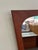 Danish wall mirror crafted in solid teak, produced by Aarhus Glasimport og Glassliberi in Aarhus, Denmark. This piece...
