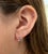 14k White Gold Swirl Earrings With Round Bezel Set Diamonds, Pair For Sale In Miami - Image 6 of 7
