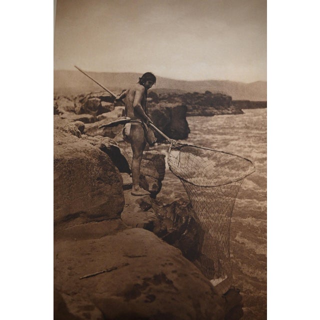 An original vintage photogravure from Edward S. Curtis's The North American Indian, Portfolio VIII (published 1911) — one...