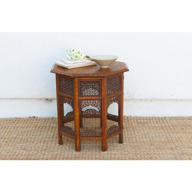 Fold this table down and it collapses flat in seconds, exactly as it was designed to a century ago. The octagonal top is...