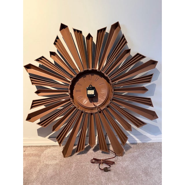 Spartus Wood Look 32 Point Starburst Wall Clock Beautiful vintage Spartus brand starburst clock features 32 faux wood...