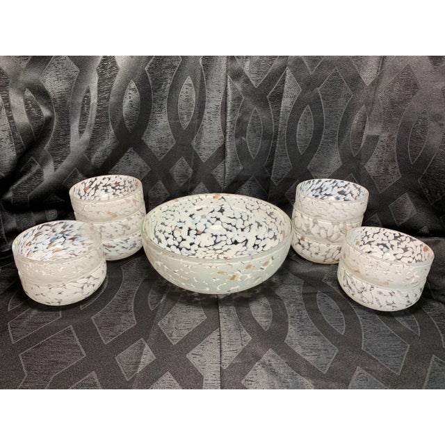 Offered is a simple and elegant Cenedese Murano glass set of serving bowls. These very heavy bowls feature a splatter...
