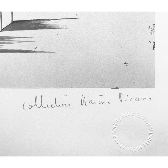 Artist: Pablo Picasso (after) Title: Arlequin Moustachu A La Guitare Medium: Lithograph on Arches paper Sheet size: 30 x...