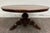 This is a stunning antique French Renaissance Revival or Victorian Renaissance solid oak round dining table dating to the...