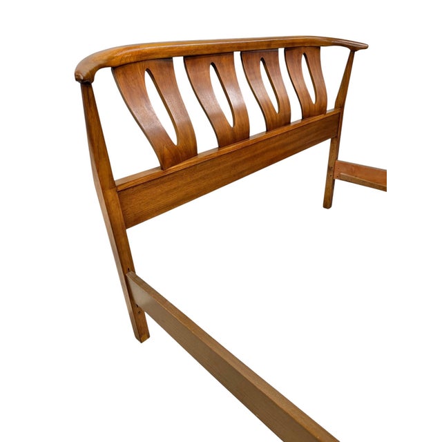 Elevate your bedroom with this handsome Mid-Century Modern full-size bed by Kent Coffey, dating to the 1960s. Crafted in...