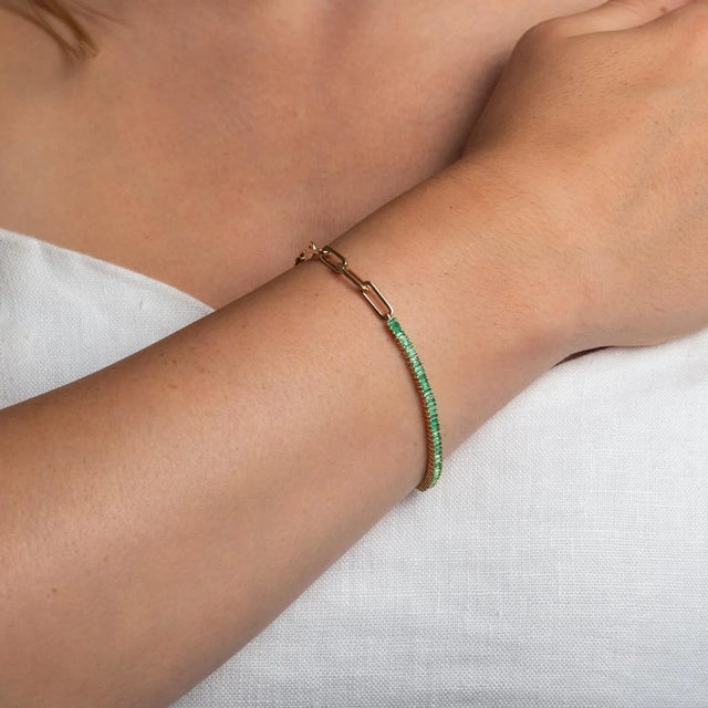 This is part of Chairish’s Fine Jewelry assortment. Baguette emeralds are sophisticated and chic. Here we paired the...