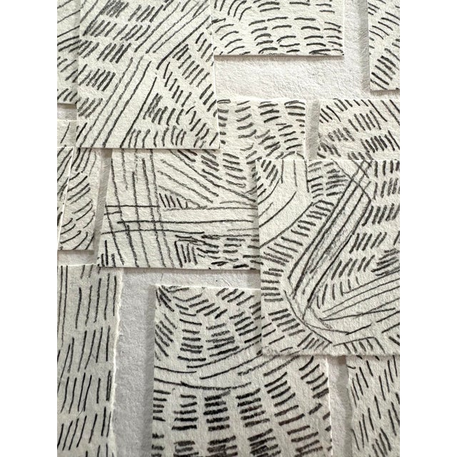 Barbara Beck early 90s graphite on paper, cut paper collage in white wood frame.