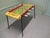 This is one for the Boys, it is a 1950s football game, it is in pretty good condition for its age all the players are...