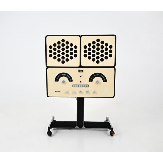 White Brionvega stereo radio. The radio and record player work perfectly. It also has Bluetooth for connecting a mobile...