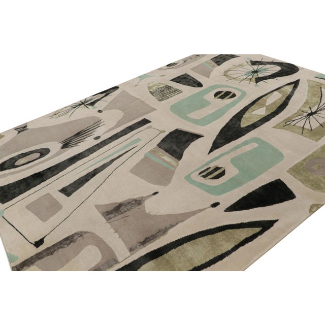Hand-knotted in all-natural silk, this 8x10 modern rug is a new addition to the Mid-Century Modern rug collection by Rug &...