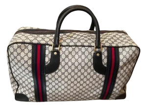 An Iconic 1980s Gucci Vintage Monogram Canvas Travel Bag