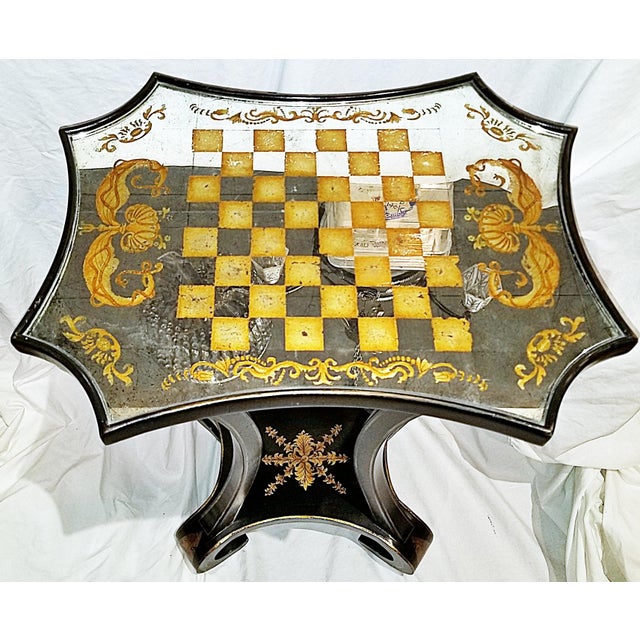 What a fun regence' style modern day take on a small game table with antiqued mirrored top and jappaned black and gold...