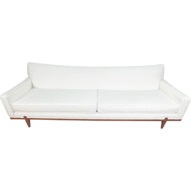 Experience the epitome of style and comfort with this comfortable sofa. Its sleek mid-century design is enhanced by a...