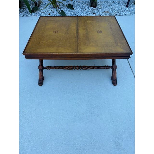 Attributed to Theodore Alexander Leather Top Shoe Foot Coffee Table ( missing label mark).High Quality construction with...