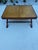 Attributed to Theodore Alexander Leather Top Shoe Foot Coffee Table ( missing label mark).High Quality construction with...