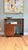 Featuring rich walnut in gorgeous grain patterns, piano hinge bi-fold cabinet door with beautifully carved atomic pulls....