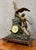 Large napoleon iii period clock in spelter with a double patina of brown and gold. depicting a spectacular eagle hunter...