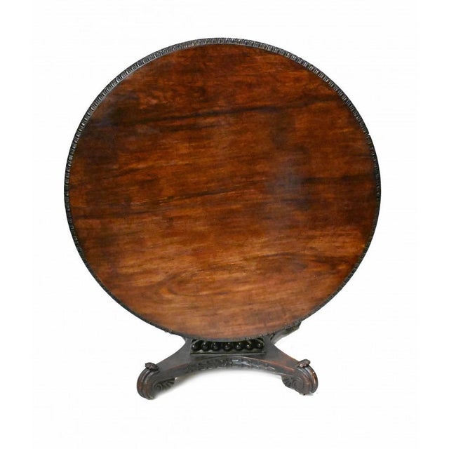 You are viewing a gorgeous Colonial - possibly Myanmar (Burmese) round dining table Hand carved from padauk wood with...