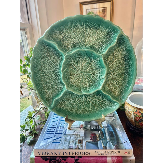 This divided serving dish is by USA Calif Pottery in the cabbage leaf pattern. It is as pretty to display as it is to use....