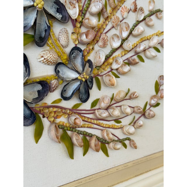 Old Florida kitschy at its finest. A charming 1975 handcrafted seashell floral arrangement featuring mussel shell flowers,...