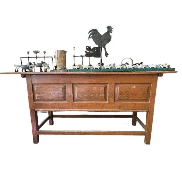 An early 1900s French baker's table with lift top — a versatile sideboard with wonderful age. Measures 82"W x 24"D x 36"H....